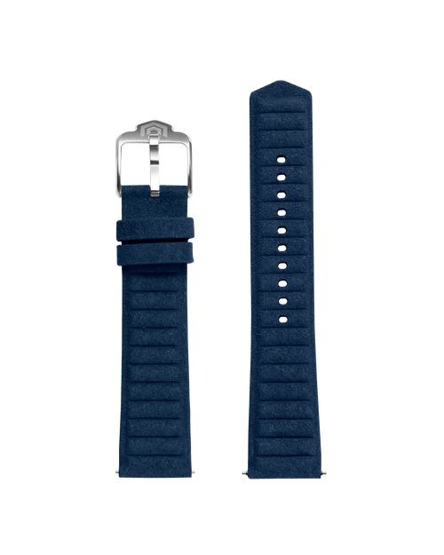 Both halves of the navy embossed strap laid flat, with the polished VOXEL pin buckle and adjustment holes visible