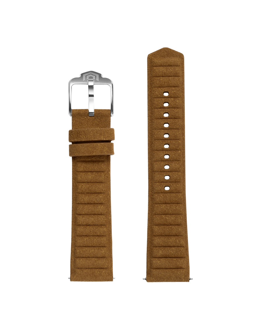 Both halves of the tan embossed strap laid flat, with the steel VOXEL pin buckle and adjustment holes
