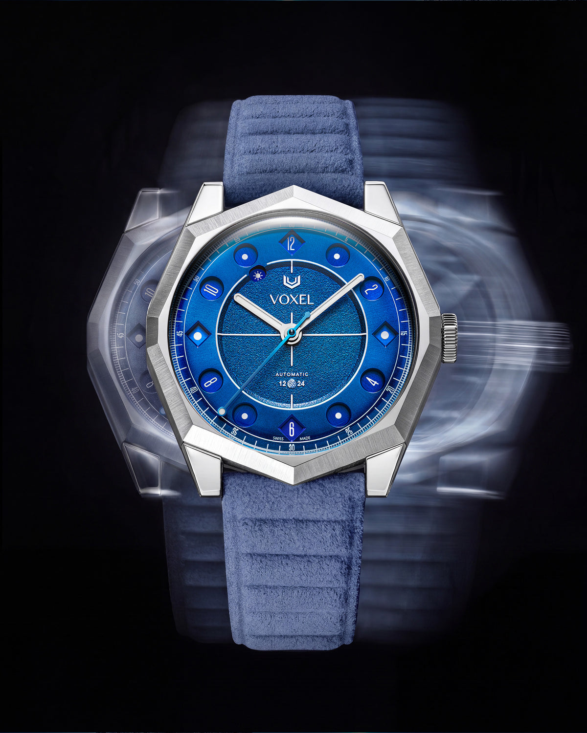 VOXEL Meridion Electric Blue Dial with light blue Alcantara strap, front view with motion effect on a black background