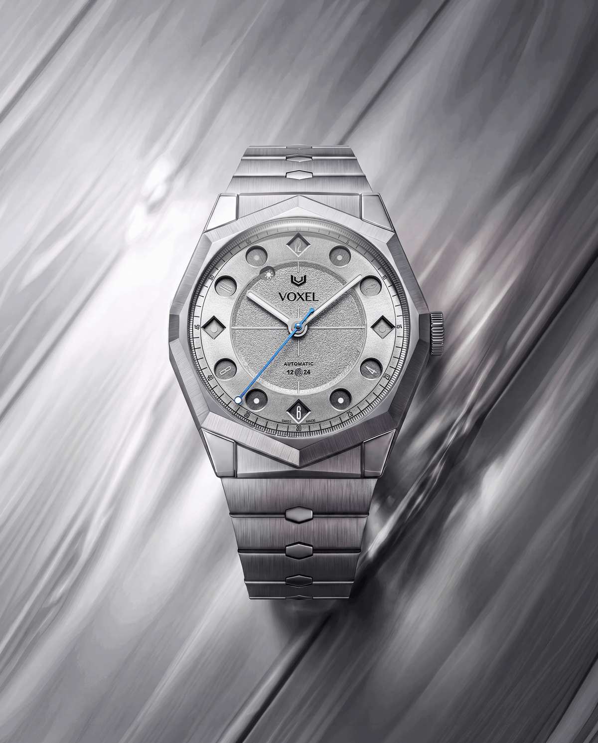 VOXEL Meridion on integrated 904L steel bracelet, silver star dial in 12-hour mode