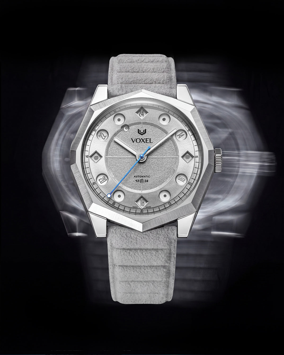 VOXEL Meridion Swiss Made automatic watch with light grey Alcantara strap on a black background