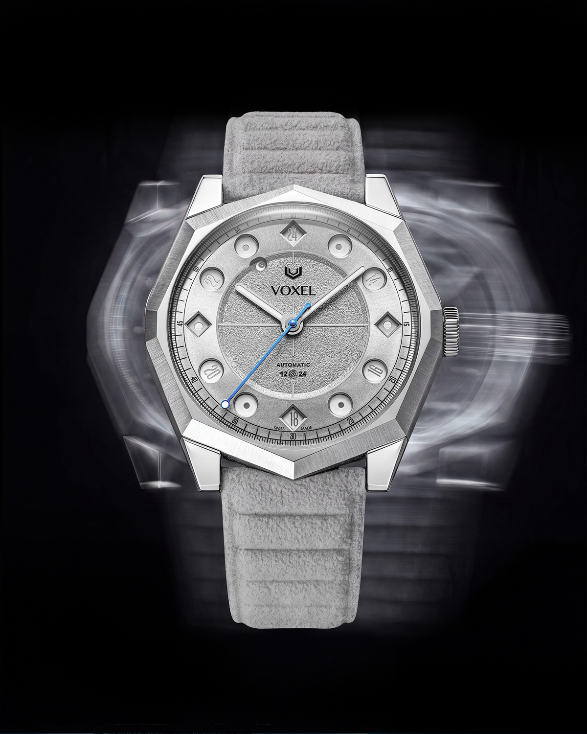 VOXEL Meridion Silver Star Dial automatic watch with light grey Alcantara strap, front view with motion effect on a black background
