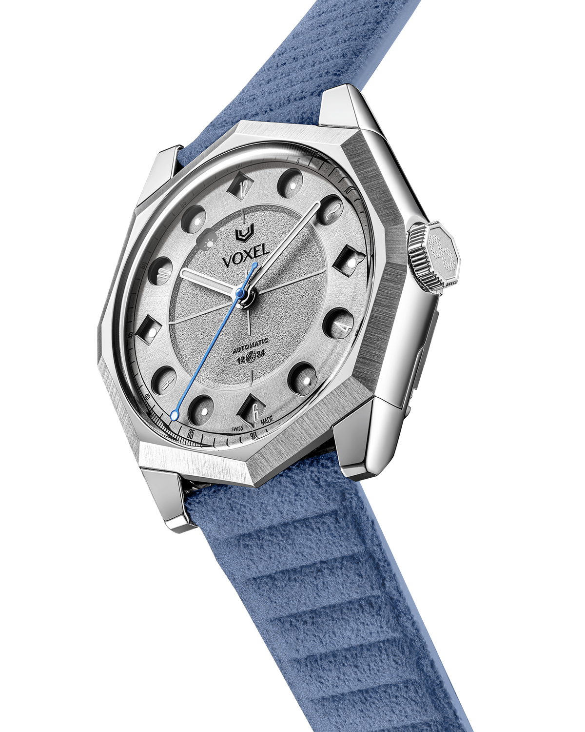 Side view of the VOXEL Meridion showing the decagonal case and crown, light blue Alcantara strap